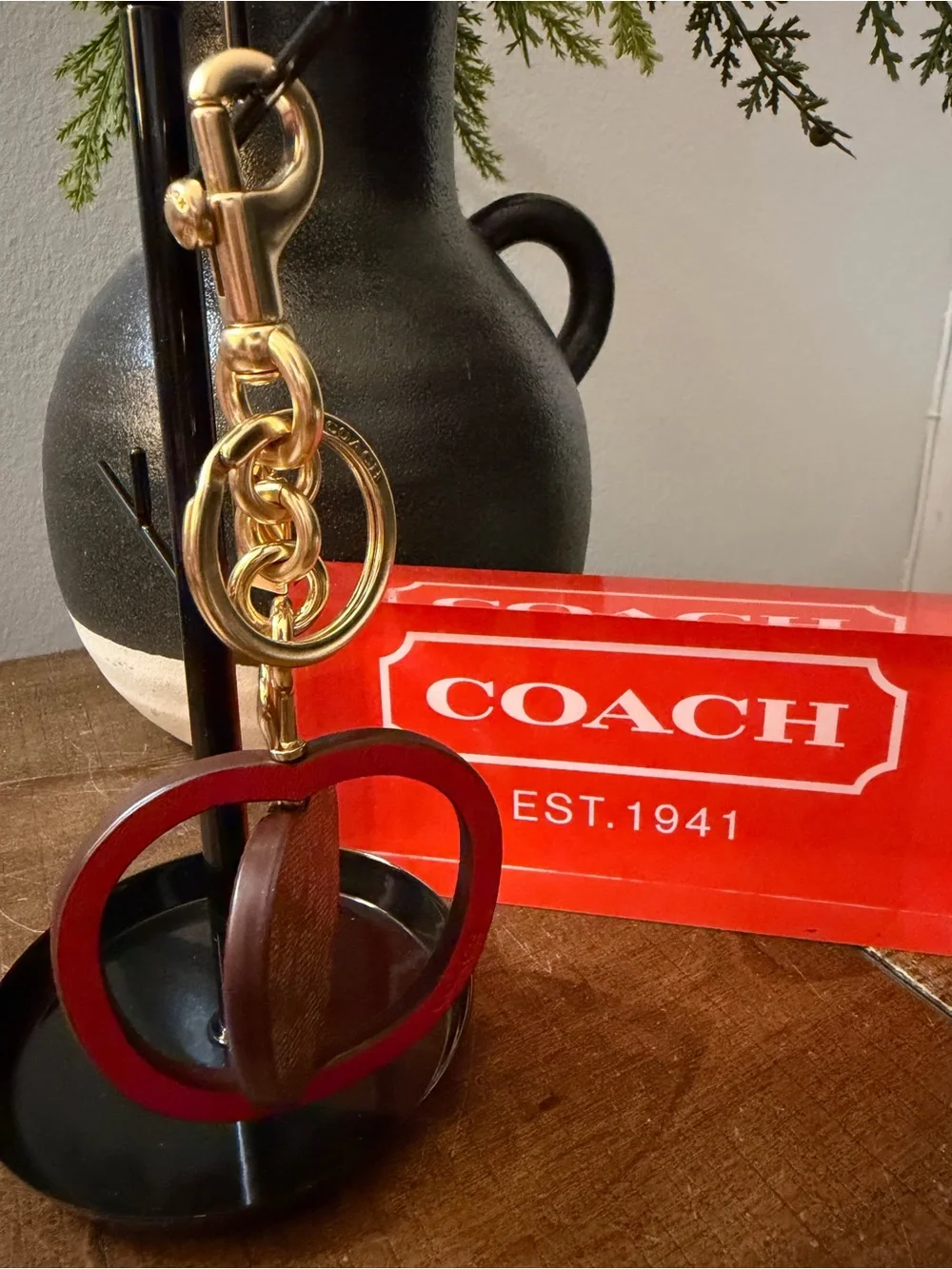 Coach Swivel Apple Charm